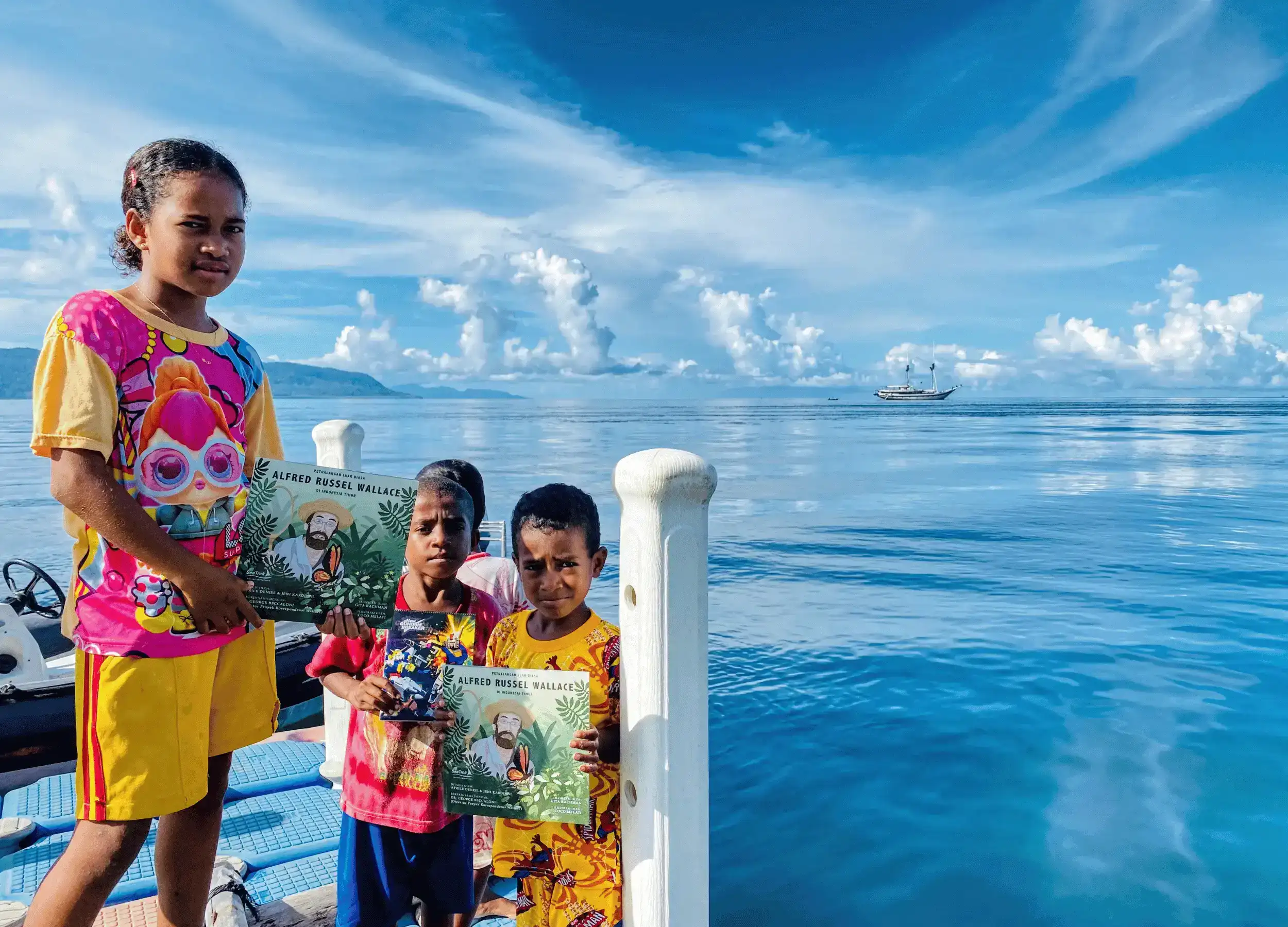 Kids with Alfred Russel Wallace's book