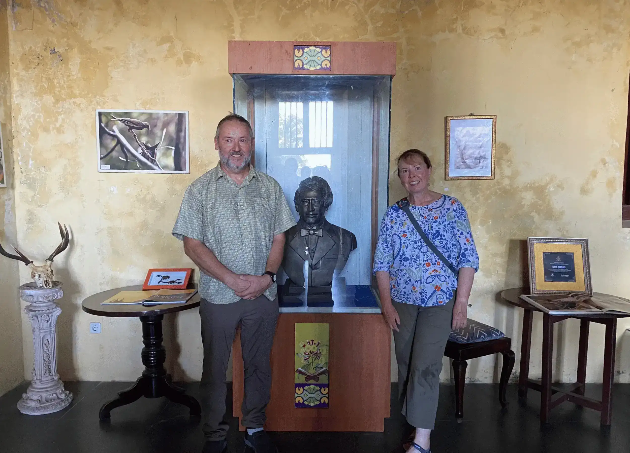 Bill Wallace and Natalie with Alfred Russel Wallace statue in the museum in Ternate