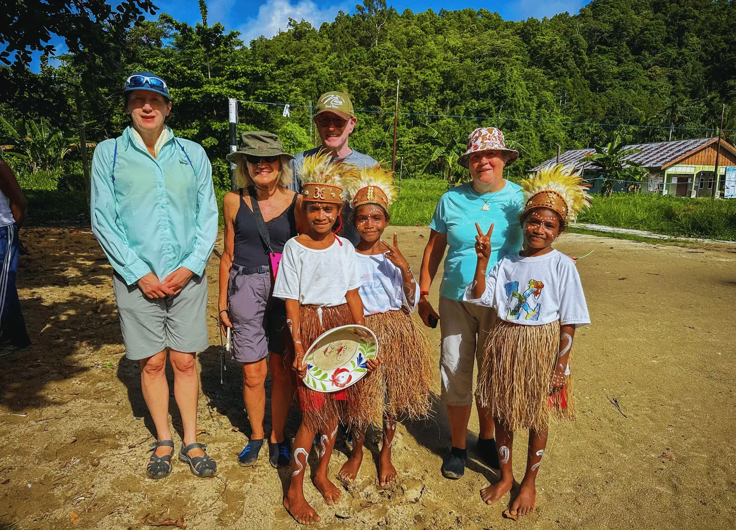 Meet the local kids in Raja Ampat with their beautiful costumes.