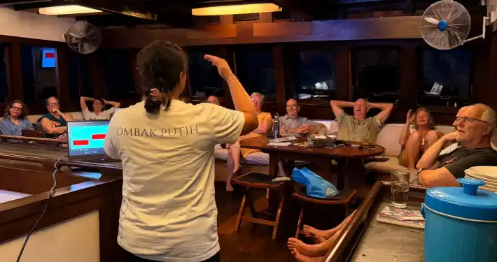 Tour leader giving night presentation