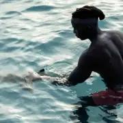 Gibbs Kuguru with a Shark
